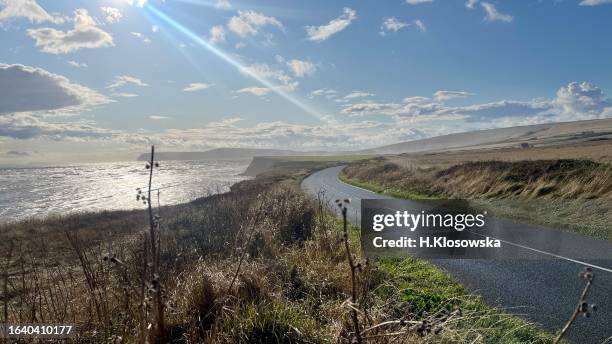 coastal road - isle of wight village stock pictures, royalty-free photos & images