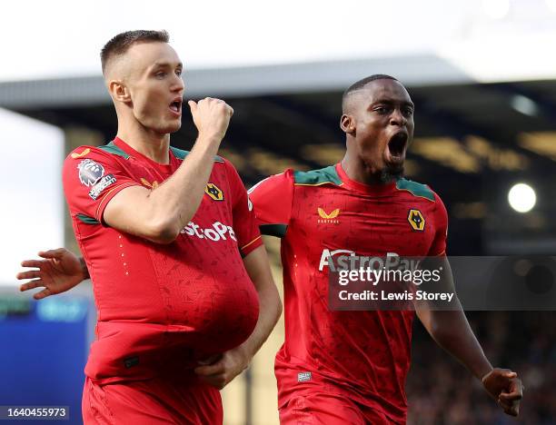 Sasa Kalajdzic of Wolverhampton Wanderers celebrates after scoring the team's first goal during the Premier League match between Everton FC and...