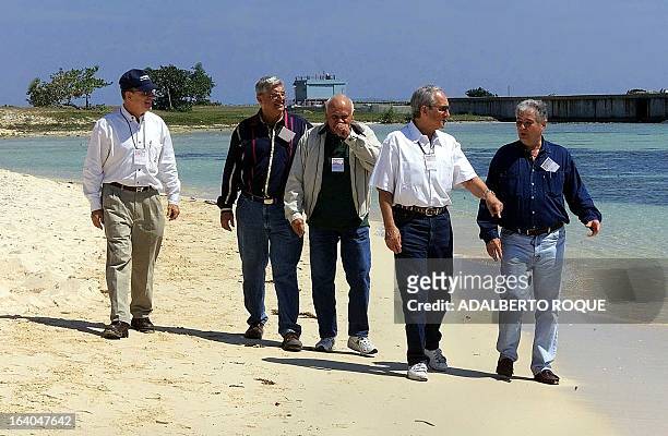 Jose Luis Hernandez , Mario Cabello Gonzalez , Luis Torne , Alfredo Duran and Roberto Carballo, five anti-Castro Cubans, walk on the beach at the Bay...