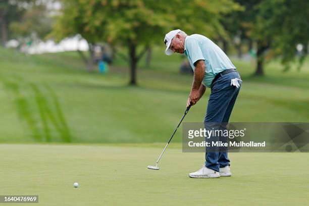 Mark O'Meara of the United States hits a putt on the 10th hole during the first round of the The Ally Challenge presented by McLaren at Warwick Hills...