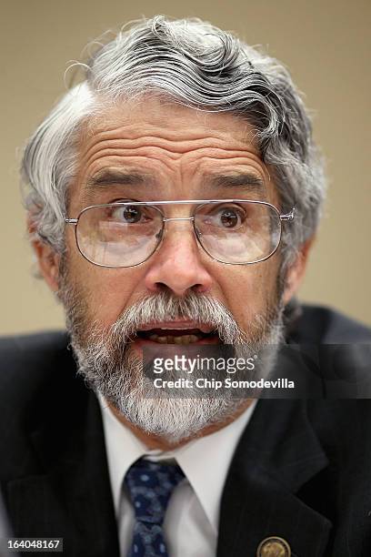 White House Office of Science and Technology Policy Director John Holdren testifies before the House Science, Space and Technology Committee during a...