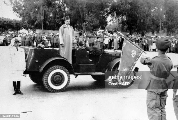 File photo taken 14 May 1956 in Rabat shows the Sultan of Morocco Muhammad ibn Yousuf and his son Prince Moulay Hassan II , chief of staff of the...