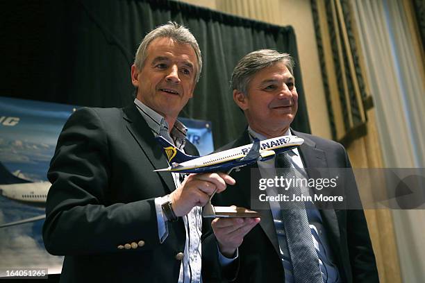 Boeing Commercial Airplanes President & CEO Ray Conner , and Ryanair CEO Michael O'Leary pose after signing a $15.6 billion purchase agreement on...