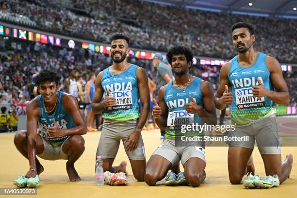 Rajesh Ramesh, Muhammed Ajmal Variyathodi, Amoj Jacob, and Muhammed Anas Yahiya of Team India pose for a photo after the Men's 4x400m Relay Heats...