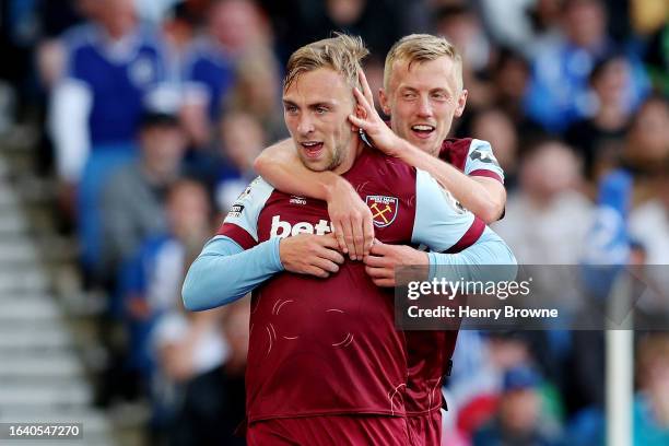 Jarrod Bowen of West Ham United celebrates with James Ward-Prowse of West Ham United after scoring the team's second goal during the Premier League...