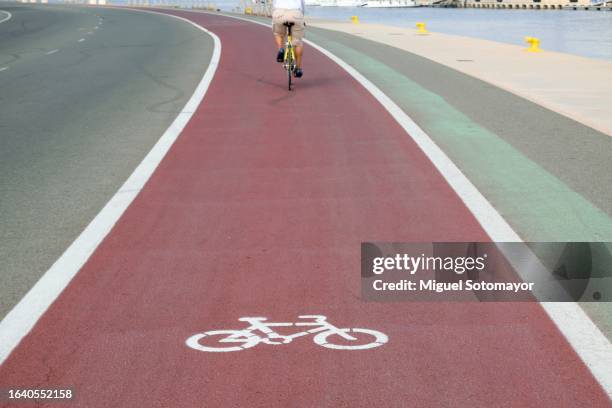 bike lane - bicycle lane stock pictures, royalty-free photos & images