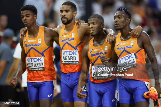 Isaya Klein Ikkink, Terrence Agard, Ramsey Angela and Liemarvin Bonevacia of Team Netherlands look on in the Men's 4x400m Relay Heats during day...