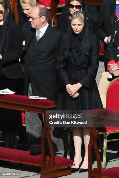 Prince Albert II of Monaco and his wife Princess Charlene of Monaco arrive ahead of the Inauguration Mass for Pope Francis in St Peter's Square on...