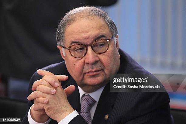 Russian billionaire and businessman Alisher Usmanov attends a meeting during a tour of the venues for the 2013 Summer Universiade March 19, 2013 in...