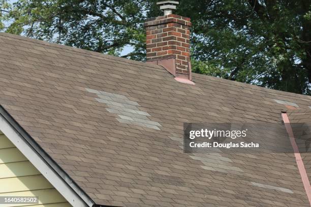 roof repair with new shingles - roof replacement stock pictures, royalty-free photos & images