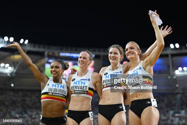 Naomi Van Den Broeck, Imke Vervaet, Helena Ponette, Hanne Claes of Team Belgium pose for a photo after the Women's 4x400m Relay Heats during day...