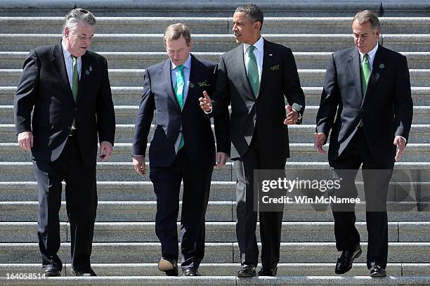 President Barack Obama is escorted by Rep. Peter King , Irish Prime Minister Edna Kenny and U.S. Speaker of the House John Boehner while leaving the...