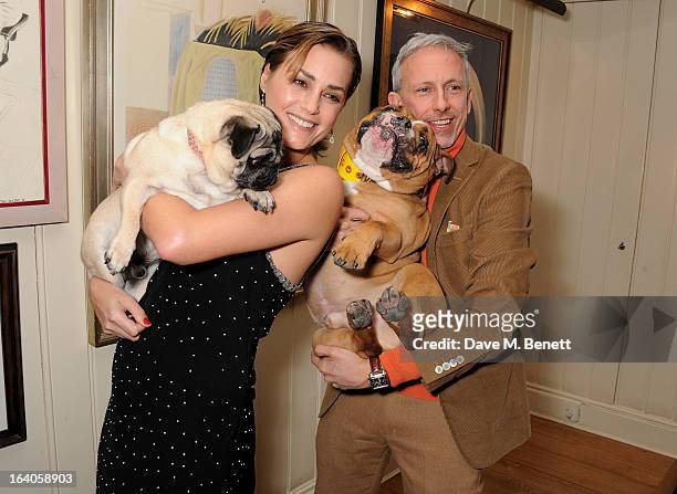 Yasmin Le Bon and Patrick Cox attend Dine for Dogs Trust, launching a dog friendly menu at The George Club on March 19, 2013 in London, England.