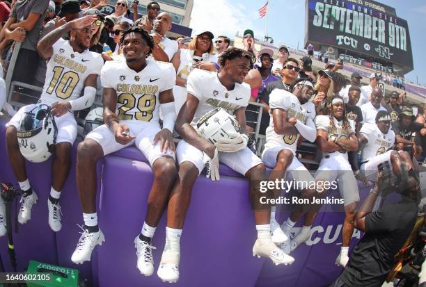 The Colorado Buffaloes celebrate the team's 45-42 win over the TCU Horned Frogs at Amon G. Carter Stadium on September 2, 2023 in Fort Worth, Texas.