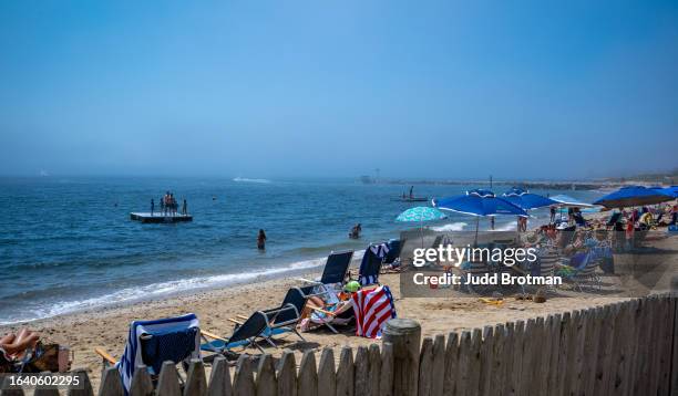 hazy day at the beach - cape cod stock pictures, royalty-free photos & images