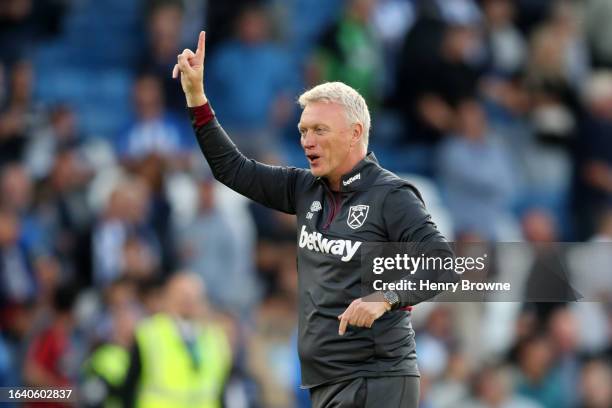 David Moyes, Manager of West Ham United, celebrates victory following the Premier League match between Brighton & Hove Albion and West Ham United at...