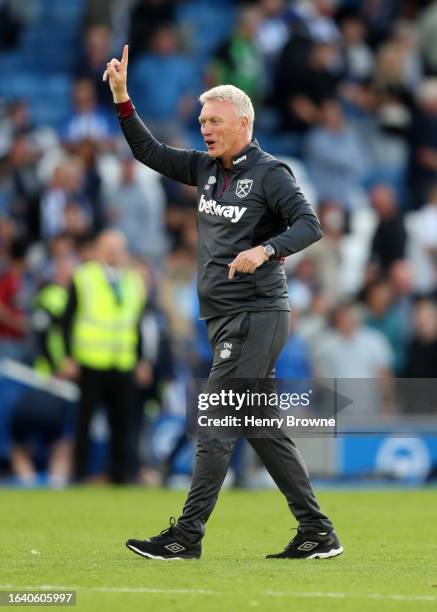 David Moyes, Manager of West Ham United, celebrates victory following the Premier League match between Brighton & Hove Albion and West Ham United at...