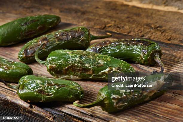 flame grilled jalapeno peppers - jalapeno pepper stock pictures, royalty-free photos & images