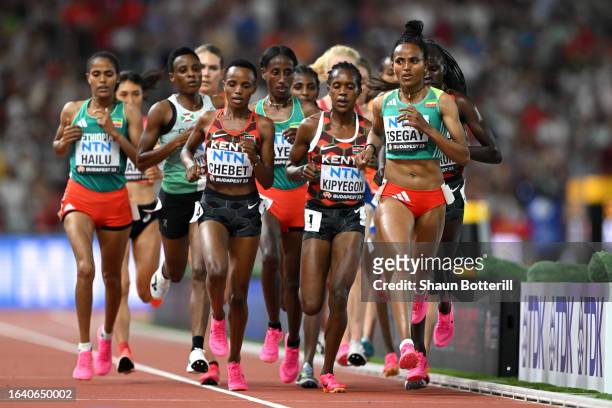 Beatrice Chebet of Team Kenya, Faith Kipyegon of Team Kenya, and Gudaf Tsegay of Team Ethiopia compete in the Women's 5,000m Final during day eight...
