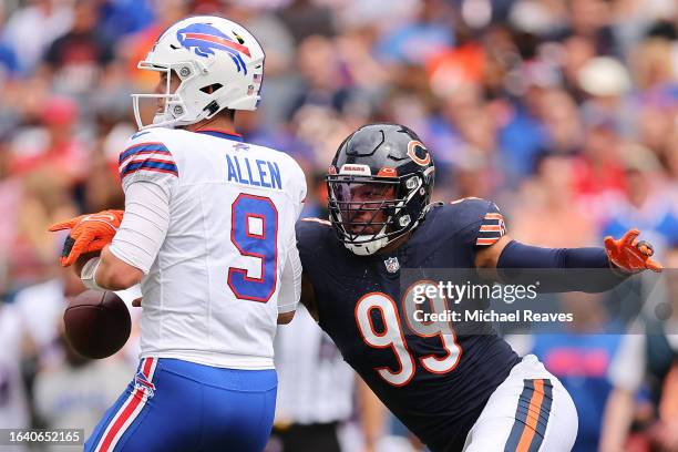 Trevis Gipson of the Chicago Bears forces Kyle Allen of the Buffalo Bills to fumble during the first half of a preseason game at Soldier Field on...