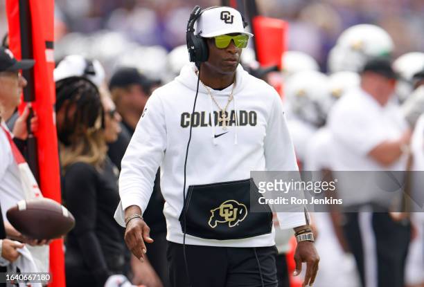 Head coach Deion Sanders of the Colorado Buffaloes watches action against the TCU Horned Frogs during the first half at Amon G. Carter Stadium on...