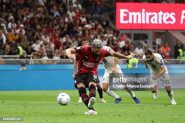Olivier Giroud of AC Milan scores the team's second goal from a penalty kick during the Serie A TIM match between AC Milan and Torino FC at Stadio...