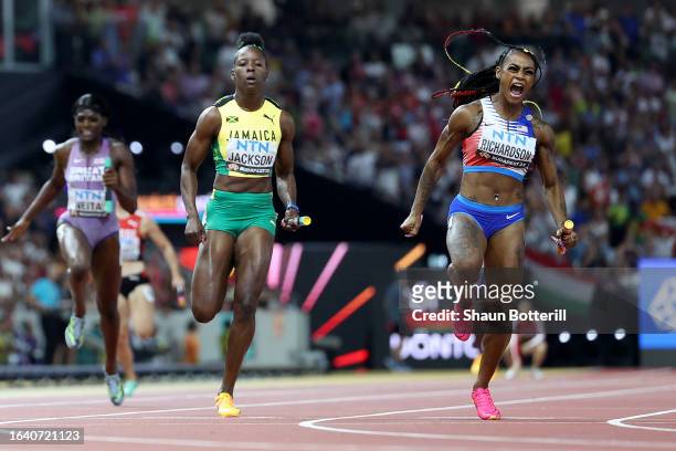 Sha'Carri Richardson of Team United States wins the Women's 4x100m Relay Final during day eight of the World Athletics Championships Budapest 2023 at...