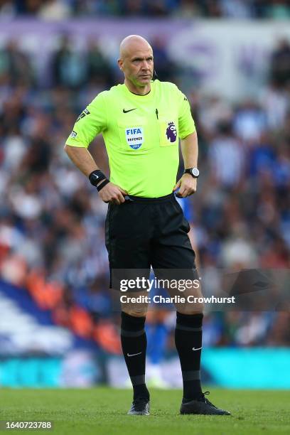 Referee Anthony Taylor during the Premier League match between Brighton & Hove Albion and West Ham United at American Express Community Stadium on...