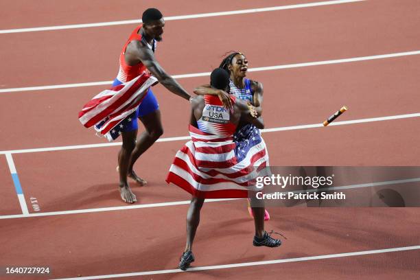 Christian Coleman of Team United States and Sha'Carri Richardson of Team United States celebrate after winning both the Men's and Women's 4x100m...