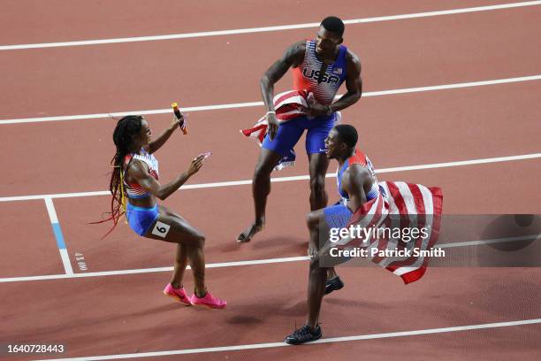 Christian Coleman of Team United States and Sha'Carri Richardson of Team United States celebrate after winning both the Men's and Women's 4x100m...