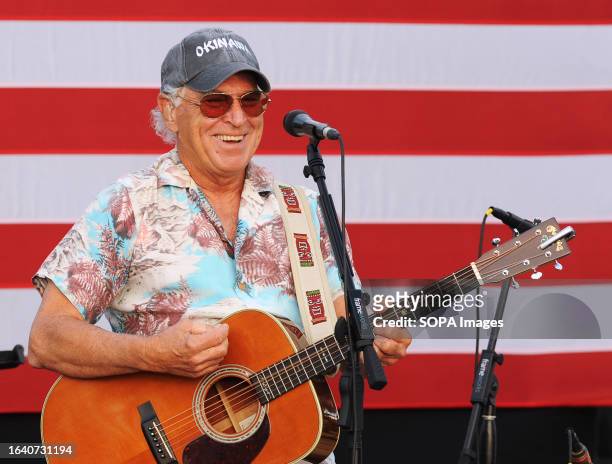 Singer-songwriter Jimmy Buffett performs at the Get Out The Vote campaign rally for Democratic presidential nominee Hillary Clinton at Albert Whitted...