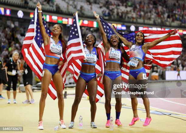 Gold medalists Gabrielle Thomas, Tamari Davis, Twanisha Terry, and Sha'Carri Richardson of Team United States celebrate after winning the Women's...