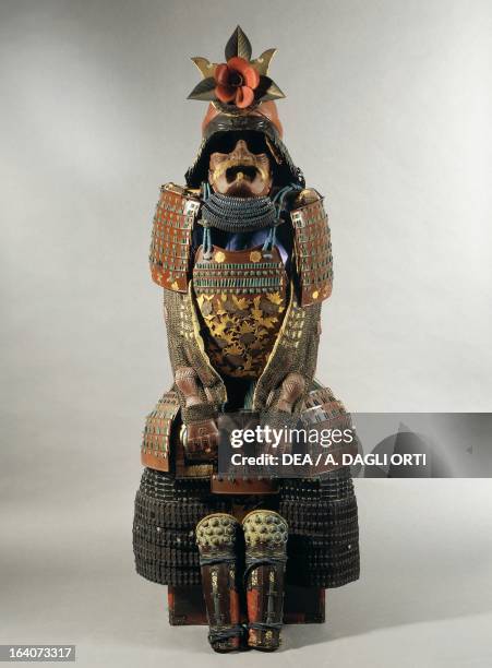 Yoko-Hagi Okegawa Do Gusoku , Samurai armour with helmet decorated with a camellia. Edo period . Japan, first quarter of 18th century. Florence,...