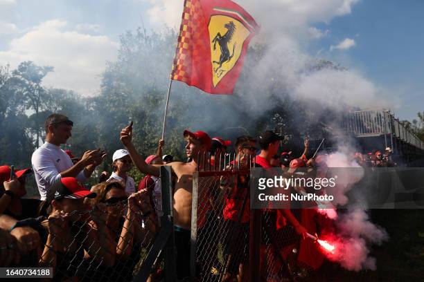 Fans, Ferrari flag and flares during qualifying ahead of the Formula 1 Italian Grand Prix at Autodromo Nazionale di Monza in Monza, Italy on...