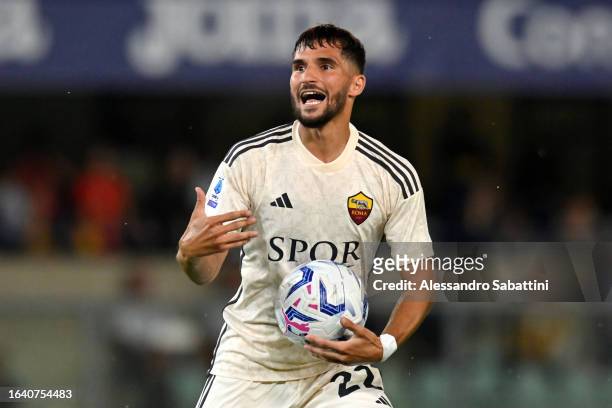 Houssem Aouar of AS Roma celebrates after scoring the team's first goal during the Serie A TIM match between Hellas Verona FC and AS Roma at Stadio...