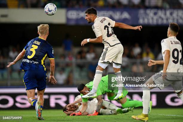 Houssem Aouar of AS Roma scores the team's first goal during the Serie A TIM match between Hellas Verona FC and AS Roma at Stadio Marcantonio...