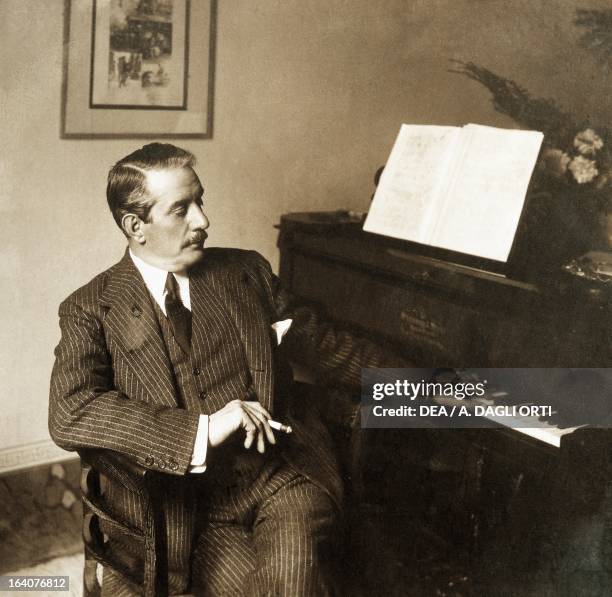 Giacomo Puccini , Italian composer, at the piano. Torre Del Lago Puccini, Museo Villa Puccini