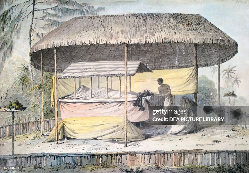 Funeral with the deceased under a canopy...