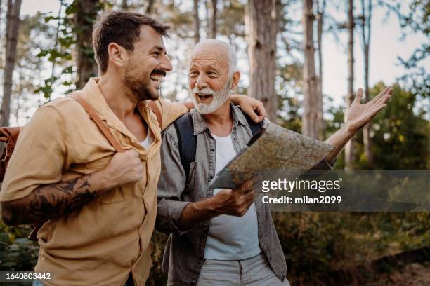 hiking together - milan2099 stock pictures, royalty-free photos & images