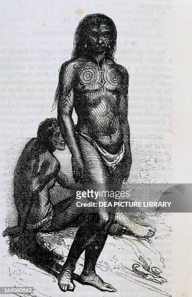 Natives of San Salvador, engraving from The life and voyages of Christopher Columbus, by Washington Irving, 1851. Bahamas, 15th century.