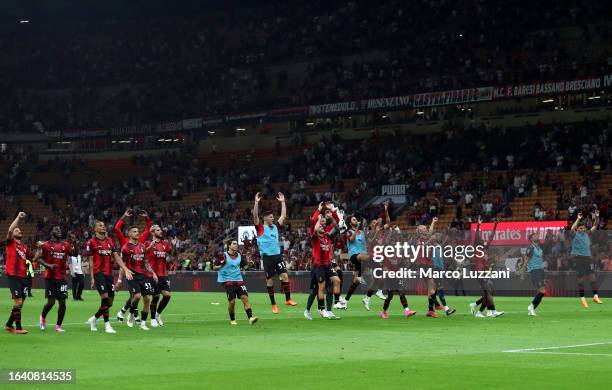 Milan players celebrate victory following the Serie A TIM match between AC Milan and Torino FC at Stadio Giuseppe Meazza on August 26, 2023 in Milan,...