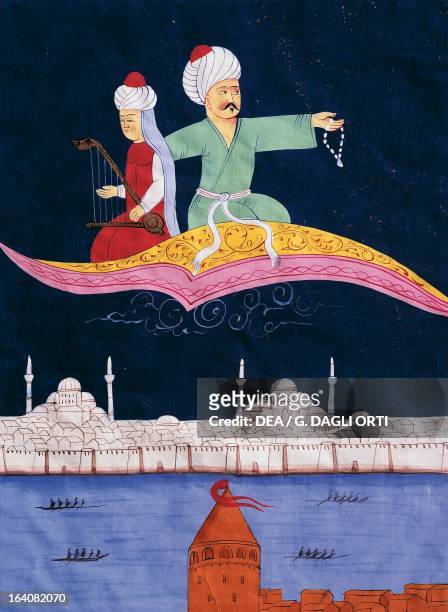 Aladdin or The magic lamp, magic carpet above Istanbul and Galata tower, miniature from The thousand and one nights, Ottoman manuscript. Turkey, 19th...