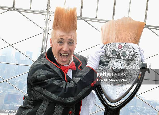 Comic daredevil Bello Nock visits 86th floor observatory at The Empire State Building on March 19, 2013 in New York City.