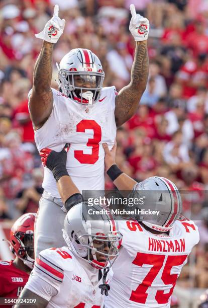 Miyan Williams and Carson Hinzman of the Ohio State Buckeyes celebrate a touchdown during the second half against the Indiana Hoosiers at Memorial...