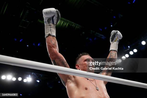 Oleksandr Usyk celebrates victory after defeating Daniel Dubois during the Heavyweight fight between Oleksandr Usyk and Daniel Dubois at Stadion...