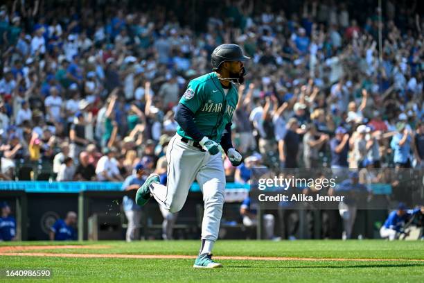 Teoscar Hernandez of the Seattle Mariners rounds the bases after hitting a solo home run during the eighth inning against the Kansas City Royals at...