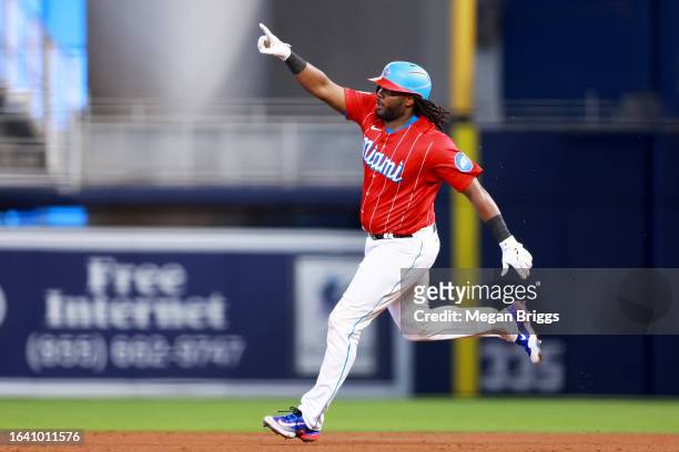 Josh Bell of the Miami Marlins rounds the bases after hitting a home run against the Washington Nationals during the sixth inning at loanDepot park...