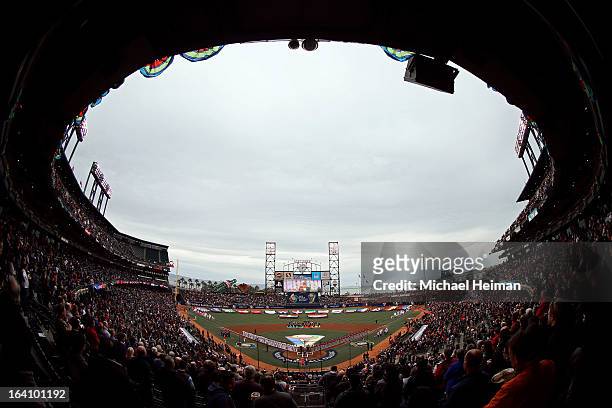 Players from the Dominican Republic and Puerto Rico take part in a pregame ceremony prior to the Championship Round of the 2013 World Baseball...