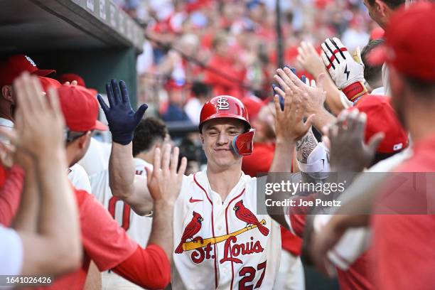 Tyler O'Neill of the St. Louis Cardinals is congratulated by teammates after hitting a three-run home run against the Pittsburgh Pirates in the...