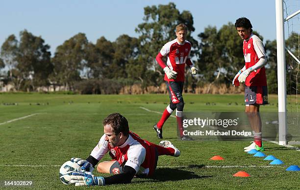 Goal keeper Clint Bolton stops the ball during a Melbourne Heart A-League training session at La Trobe University Sports Fields on March 20, 2013 in...